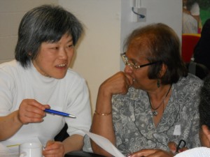 Two participants at The Trust for developing Communities 'All Our Voices Event'