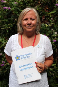 TDC's Sue Sayers with her Dementia Friends Champion Handbook