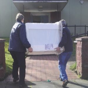 The new freezer being delivered to CHOMP