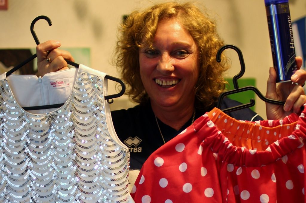 Tantrum's Sue Mechen showing off some of the dance outfits. 